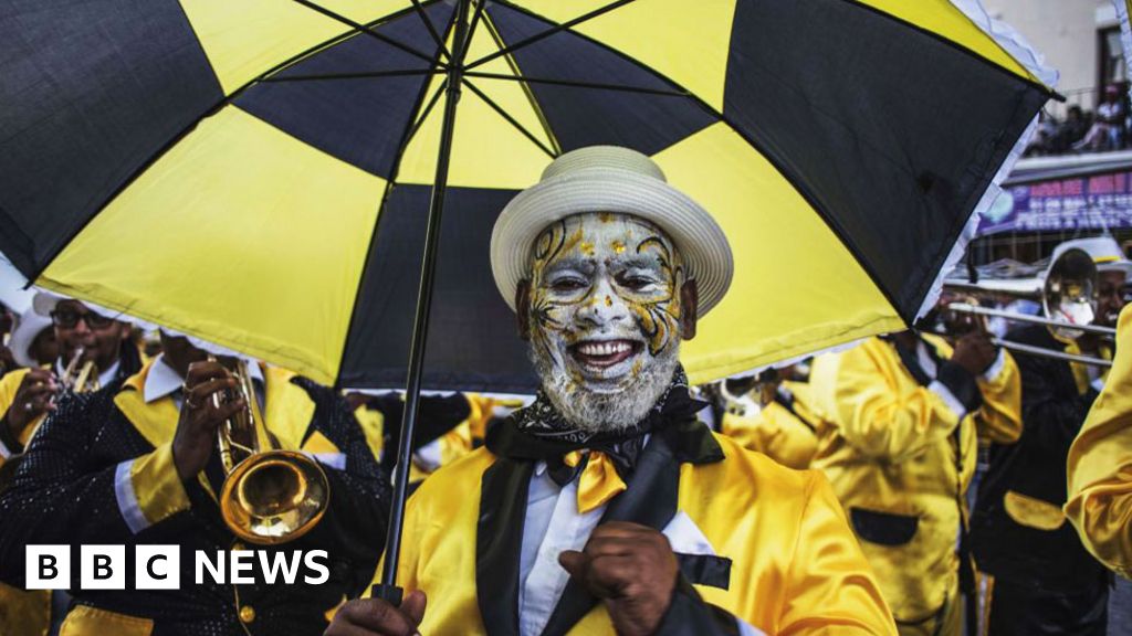 Africa's top shots: Faith, fishing and fashionable hats