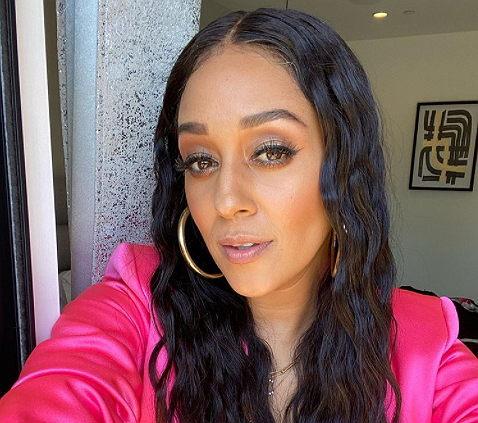 'Is That Girl Melanie?': Tia Mowry-Hardrict's Long Luscious Locks Leave Fans Gushing