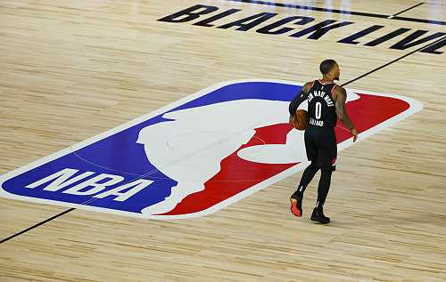 NBA photographer fired for sexist Kamala Harris post - TheGrio