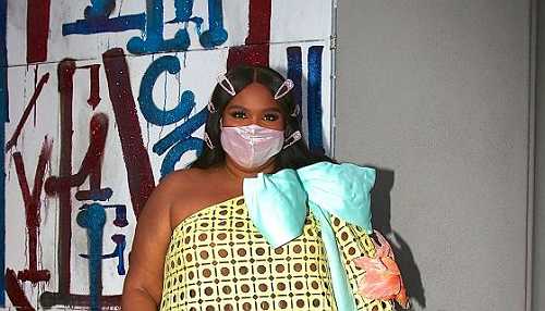 Feeling This Post-Grammys Get Up? Lizzo Brings Blingin’ Barrettes & Bedazzled Flask To After Party