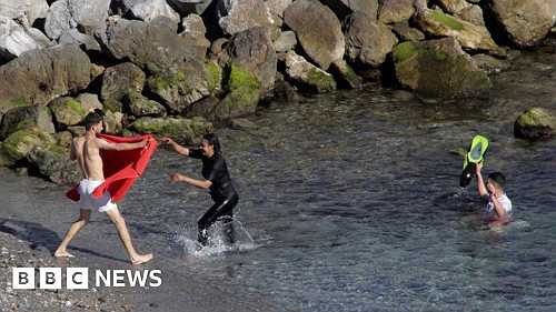 Over 100 Moroccan migrants swim to Spain's Ceuta enclave