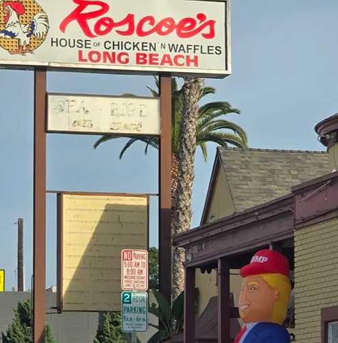 Roscoe’s Chicken and Waffles COO Defends Trump Blow Up Doll: “Business Is Up 20%” [Video]