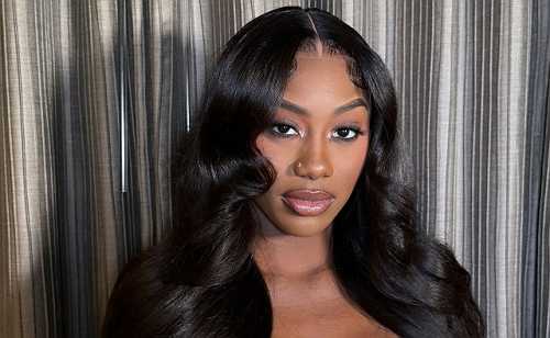 PREGNANT FLO MILLI SAYS SHE IS 'CURRENTLY ENGAGED'