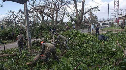 At least 11 dead in the French territory of Mayotte as Cyclone Chido causes devastating damage
