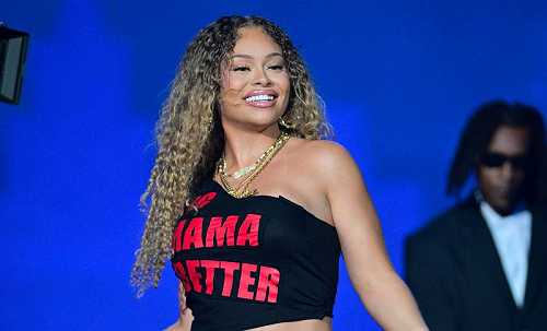 Big Latto’s Furry Louis Vuitton Miniskirt Is On The Top Of Our Christmas List