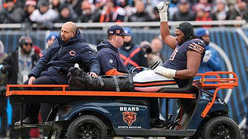 Bears LT Jones carted off field with ankle injury