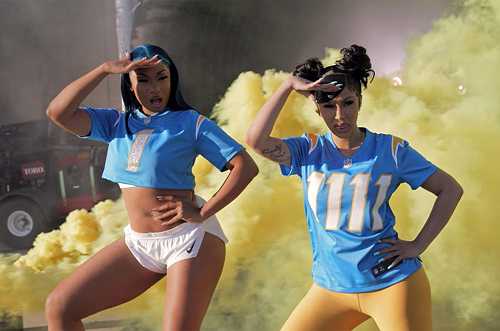 Throwback: Cardi B & Megan Thee Stallion Run A 40-Yard Dash & Learn How To Tackle