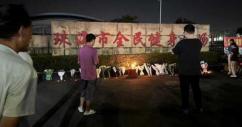 China executes 2 it says killed at least 43 in car rampage, stabbing