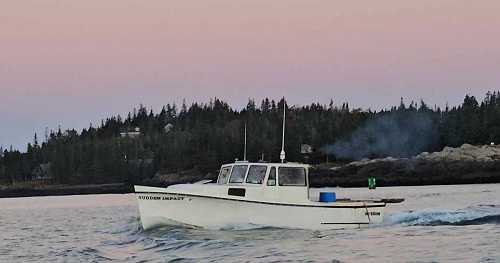 Coast Guard looking for father and son missing at sea off Maine