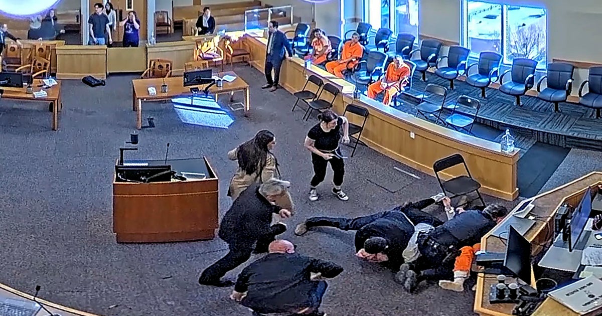 Video shows wild courtroom brawl as defendant is attacked in homicide case; 2 men and 1 woman arrested