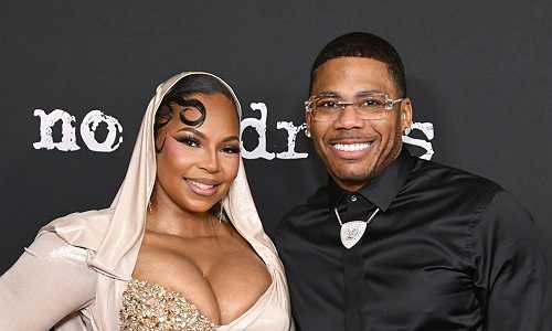 Puppet Who!? Watch Nelly React To Photographers Begging Him To Kiss Ashanti At Her Movie Premiere (VIDEO)