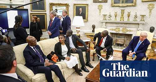 Donald Trump ambushes South Africa's president with video falsely claiming white genocide – video Donald Trump ambushes South Africa's president with video falsely claiming white genocide – video