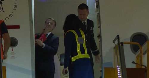 French President Emmanuel Macron responds to video of what appears to be wife shoving him