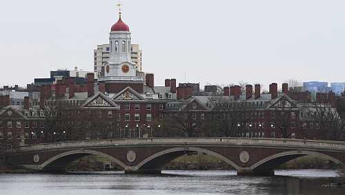 Trump administration moves to cut $100 million in federal contracts for Harvard