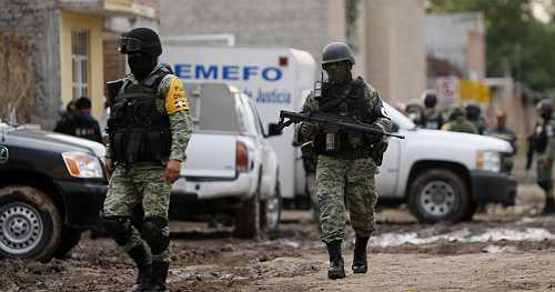 17 bodies found in house during missing persons investigation in Mexican state plagued by cartel violence
