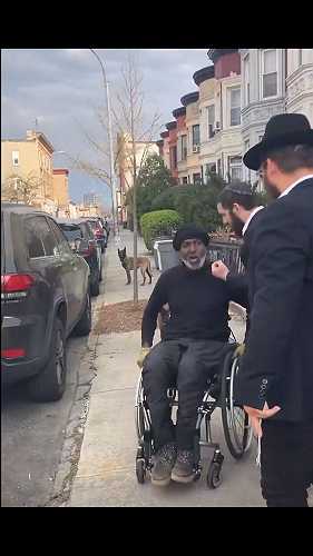 Fake Jew Pushes Black Man Out Of His Wheelchair