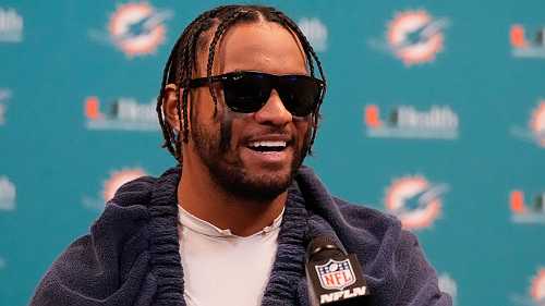 Tua overcomes swollen eye to lead Fins to win