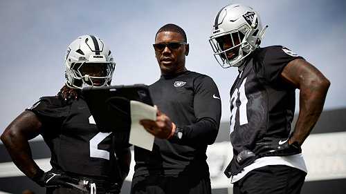 Eight years after finding his biological parents, RBs coach Deland McCullough