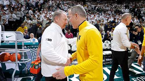 Dusty May, Tom Izzo accuse each other