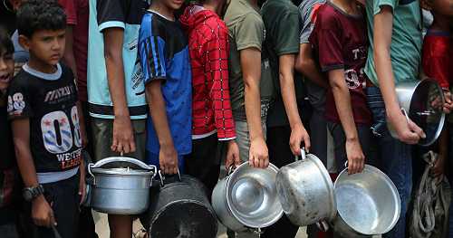 U.S.-backed Gaza aid group halts work for a day, asks Israel to minimize risks to Palestinians seeking food