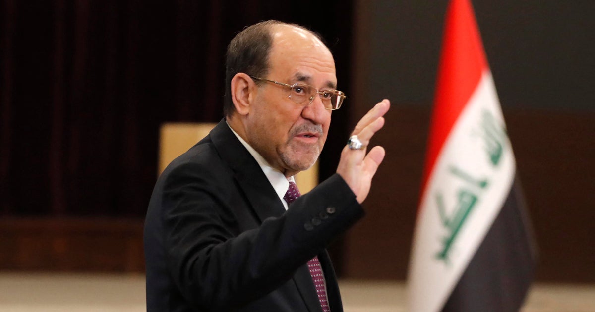 Why is Trump threatening to punish Iraq if a former prime minister is reelected?