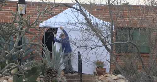 White tent set up on Nancy Guthrie