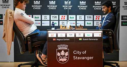 Magnus Carlsen, No. 1 ranked chess player, slams fist onto table after losing to world champ Gukesh Dommaraju