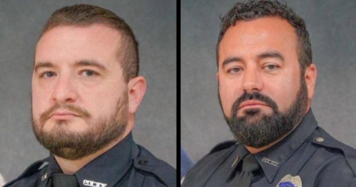 1 killed after police officers were ambushed, officials say