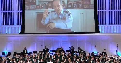 WWII veteran fulfills vow to conduct band on 100th birthday
