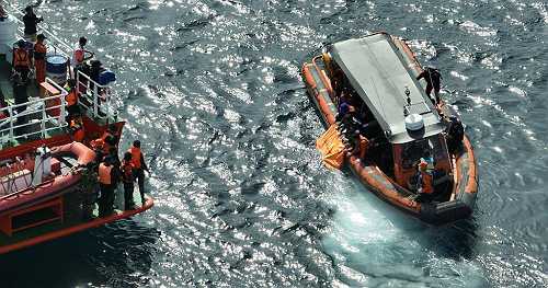 Sunken tourist boat and another body found after Spanish soccer coach, 3 children go missing off Indonesia