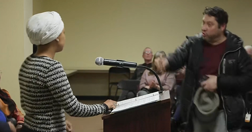 Man charges at Rep. Ilhan Omar and sprays her with substance at town hall