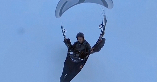 Paraglider survives being accidentally pulled 28,000 feet into air without oxygen