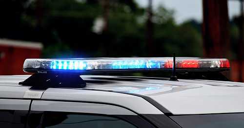 Bus crashes onto railroad tracks in L.A. area, overturns, injuring dozens