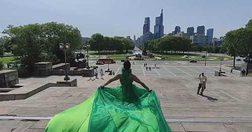 Philadelphia native turns viral "flying dress" photo shoot trend into movement of self-love