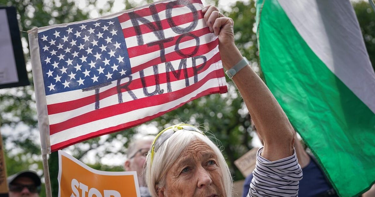 Demonstrators protest Trump