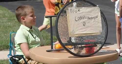 9-year-old boy opens a "compliment stand" to boost people