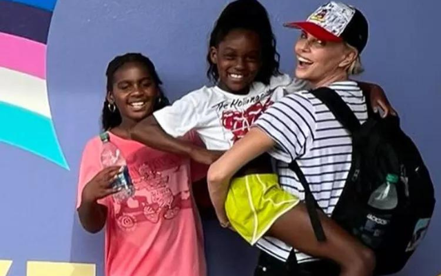 CHARLIZE THERON GETS REAL ABOUT RAISING TWO GIRLS IN ‘A HOUSE FULL OF WOMEN’