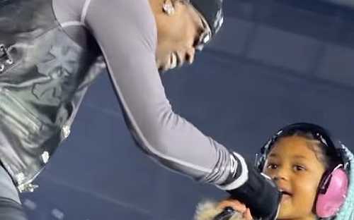 TRAVIS SCOTT BRINGS DAUGHTER STORMI ONSTAGE DURING TOKYO SHOW
