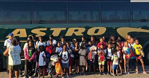 Black Couple Takes Over 30 Underprivileged Children on Vacation With Them