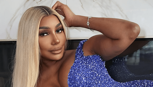 Her Man, Her Man, Her Man! NeNe Leakes Pops Out With Attorney Arthur Horne III, Sweetly Smooches Him At Grizzlies Game