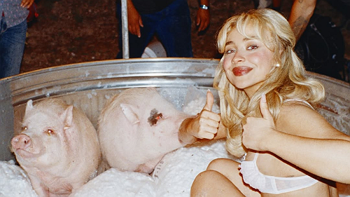 Watch: Sabrina Carpenter Takes a Scathing Summer Swing With “Manchild”