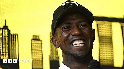 Biniam Girmay signs for Andres Iniesta