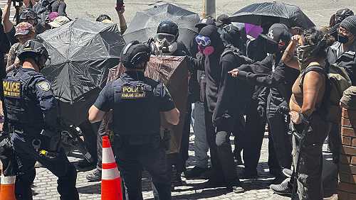 Protests over immigration raids pop up across the US with more planned