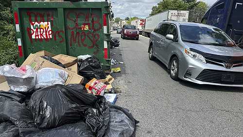 Philadelphia workers and city reach a deal to end strike that halted residential trash pickup