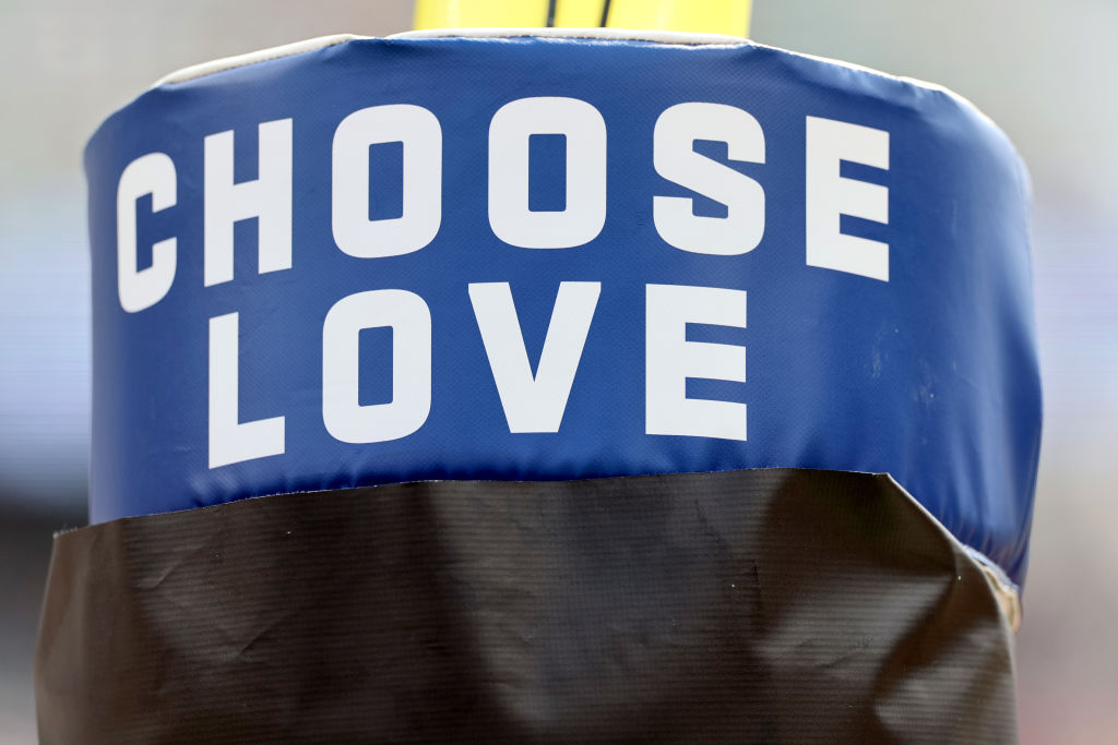 The NFL is putting “Choose love” in the end zone for MLK Day, and making it part of the playoff spotlight